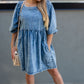 KORA DENIM BABYDOLL MINI DRESS